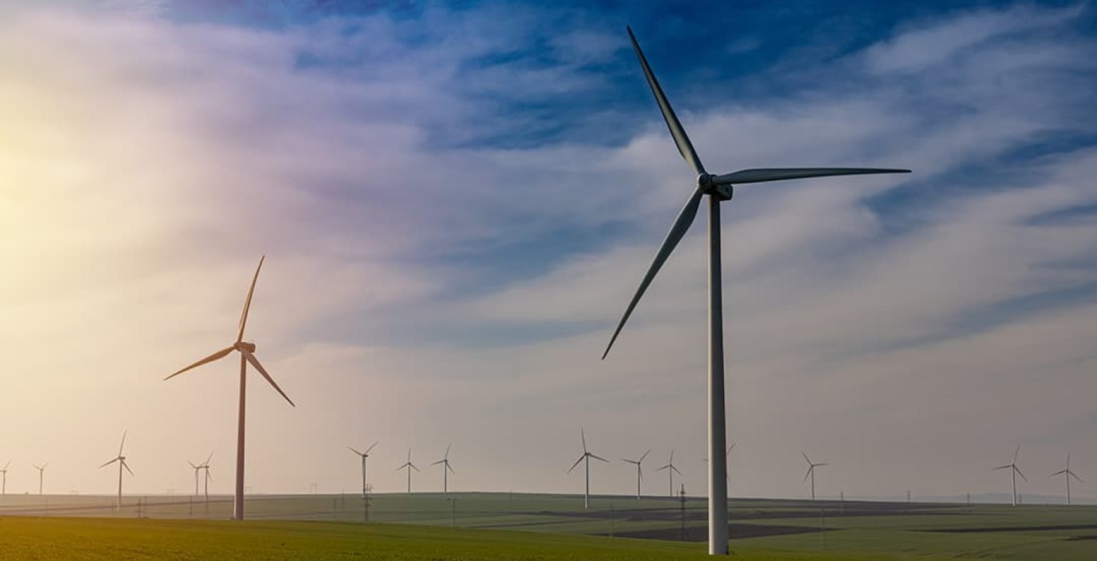 Green energy concept. Windmills for electric power. Energy production
